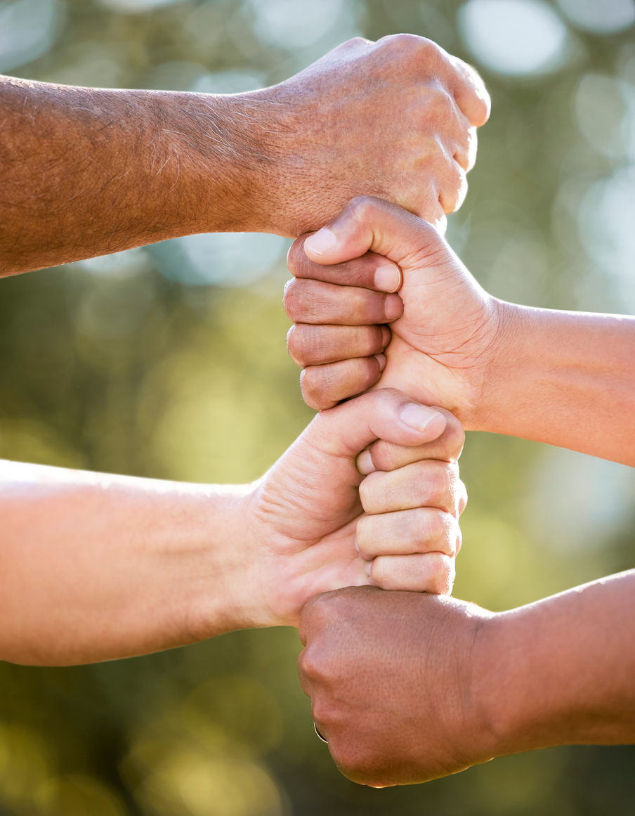 Hands joining together- community support